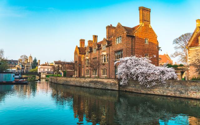 Kayaking In Cambridge featuring old waterside buildings