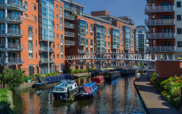 Canal boats and modern waterfront buildings in Birmingham