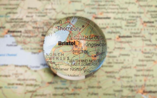 Magnifying glass over Bristol on a map