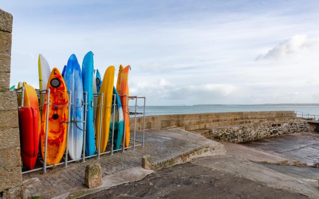 Kayaks available beside the water in Cornwall