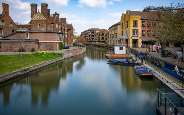 Historic Cambridge buildings reflected in the River Cam