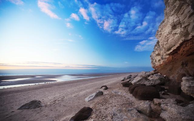 Red and white cliffs above the beach at Hunstanton