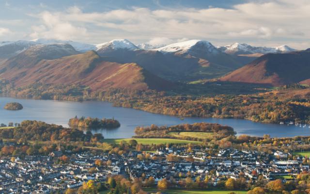 Derwentwater and wooded islands beneath snow-dusted Lake District fells