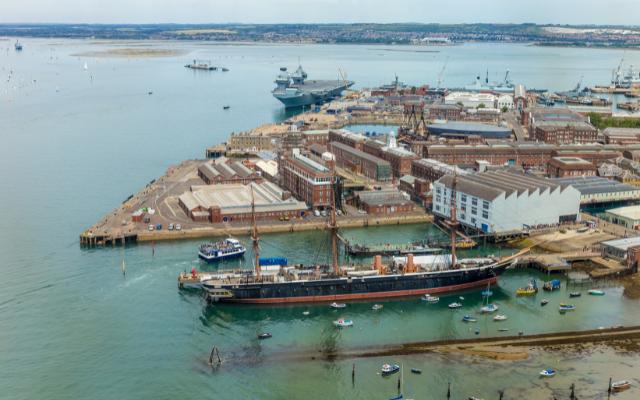 Aerial view across Portsmouth’s naval dockyard and harbour
